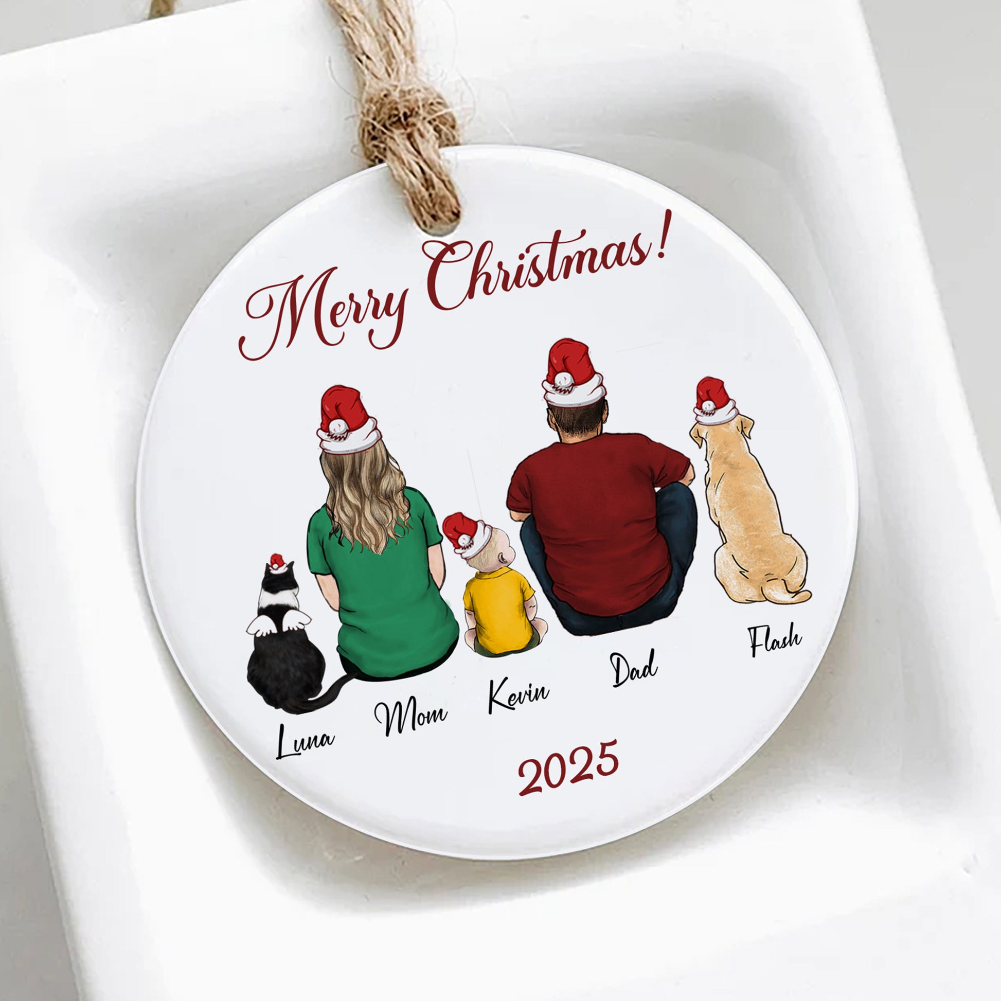 Personalized Christmas ornament with family members and pets on a white background