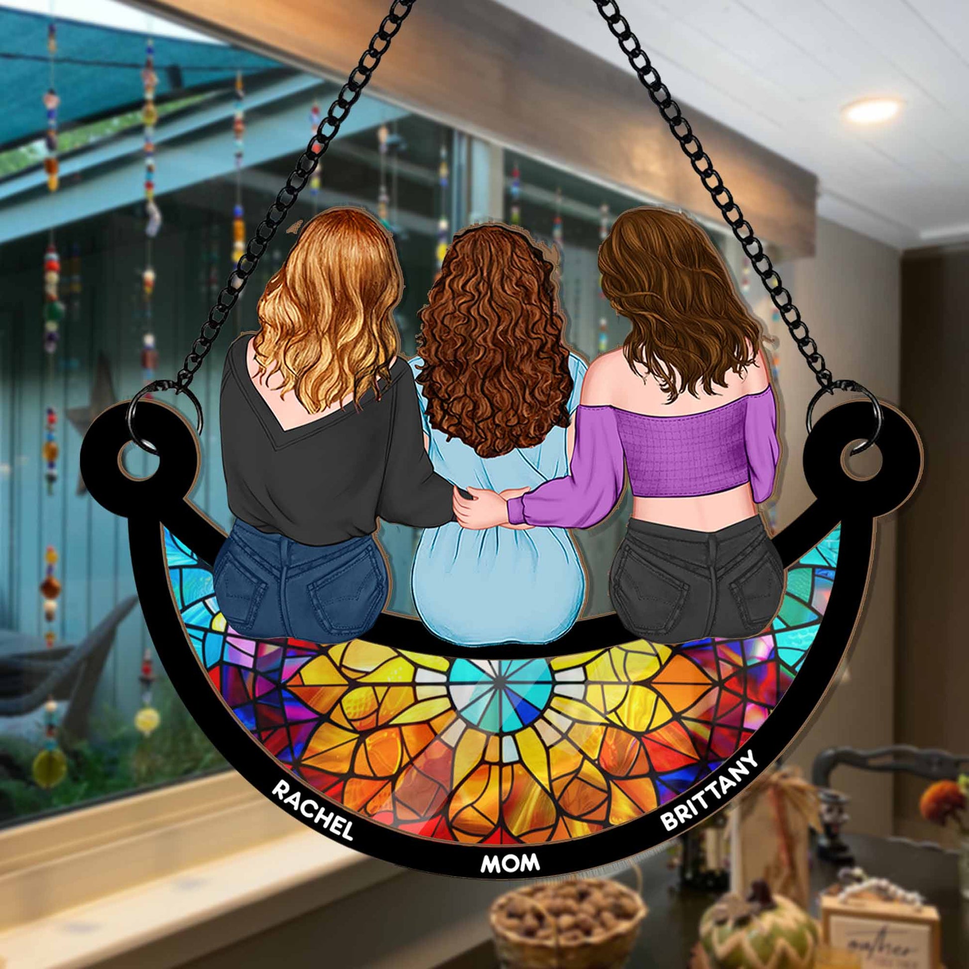 Stained glass window with three people sitting together, labeled 'Rachel', 'Mom', and 'Brittany'.