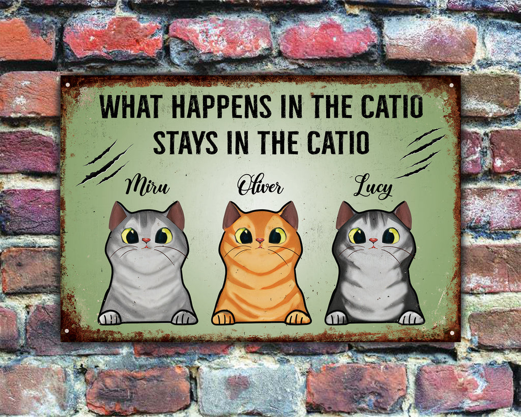 Metal sign with cartoon cats and text on a brick wall background