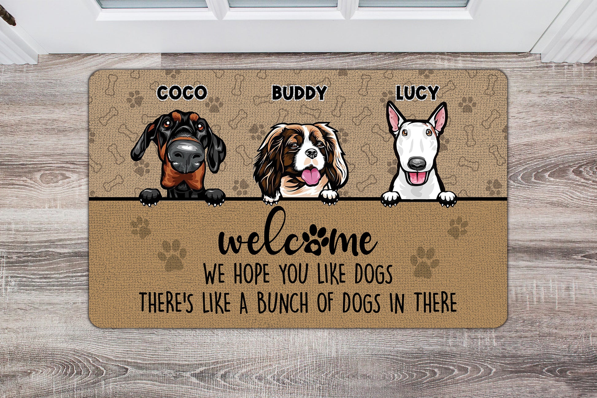 Doormat with cartoon dogs and text on a wooden floor